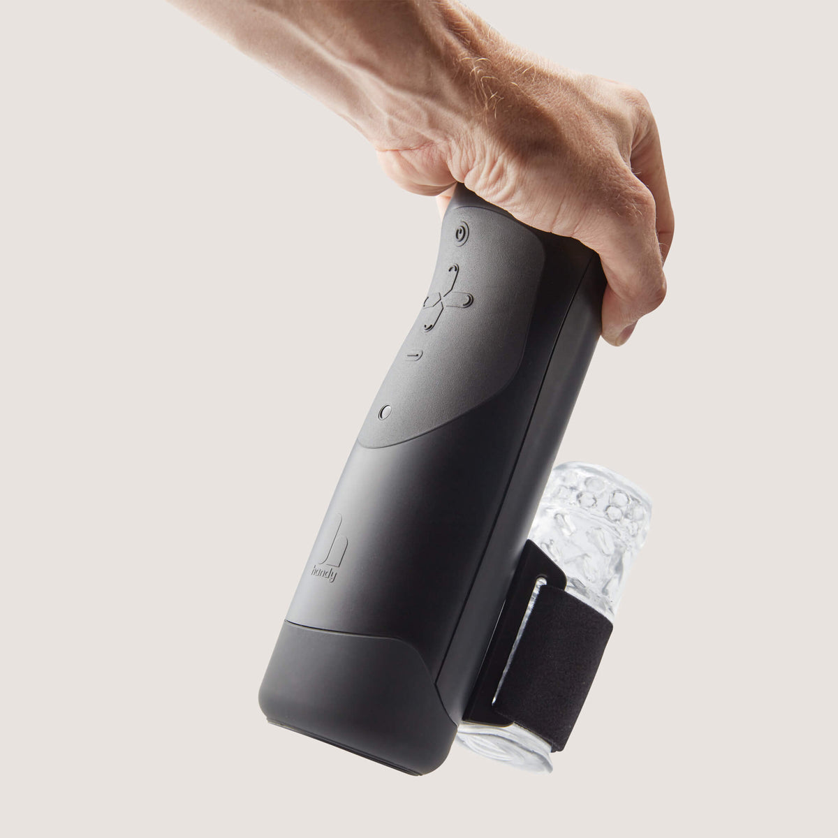 Hand holding The Handy with a clear sleeve