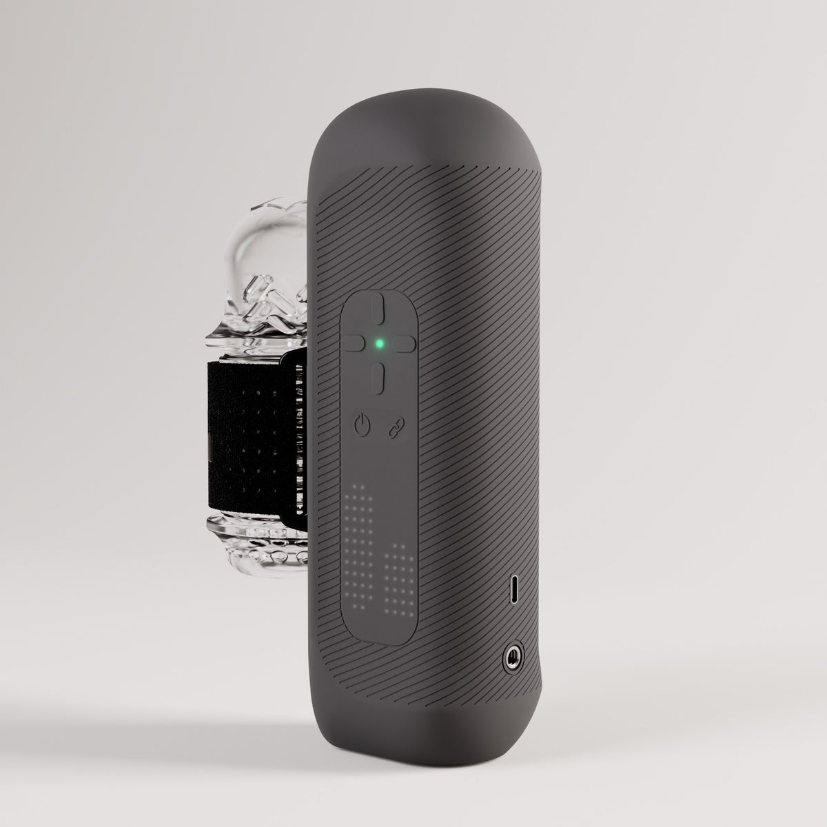 The Handy 2 interactive stroker in dark grey with a clear sleeve